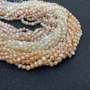 Macro view of assorted natural freshwater baroque pearls in white champagne and pink tones