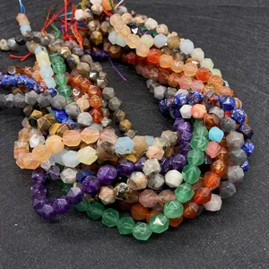 Macro view of multi-color faceted natural stone beads like agate and amethyst for DIY