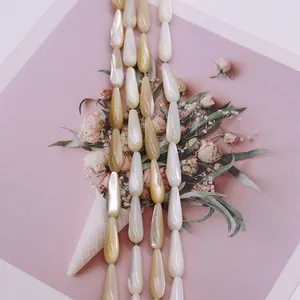 Teardrop shell beads in white and champagne gold colors for DIY jewelry making