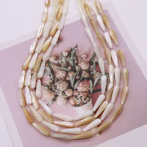 Natural seashell teardrop beads in cream and brown for DIY jewelry making and necklaces