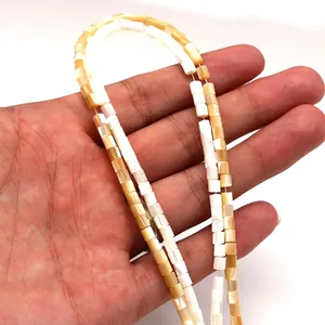 Natuurlijke schelp cilinderkralen in crème en champagne goud voor DIY sieraden maken