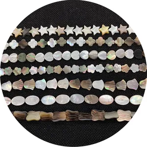 Assorted natural shell beads in star, heart, and clover shapes with pearl luster