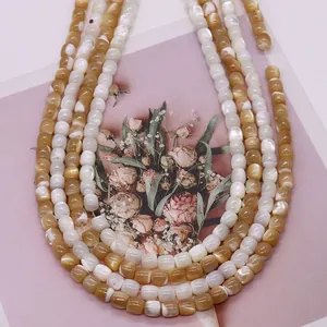 Natürliche Seemuschel-Perlen in Fassform für DIY-Schmuck in Creme-Weiß und Champagner-Gold