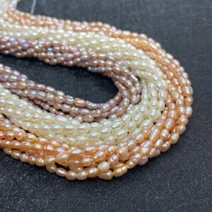 Macro detail of natural freshwater pearls in white, pink, and purple for DIY jewelry making