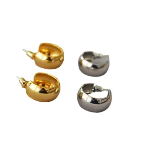 Minimalist chunky metallic C-shaped hoop earrings in gold and silver finish for women