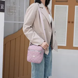 Pink heart quilted crossbody messenger bag for women with adjustable shoulder strap