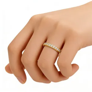 Detailed view of an eternity ring with circular zircons on a gold-plated silver band