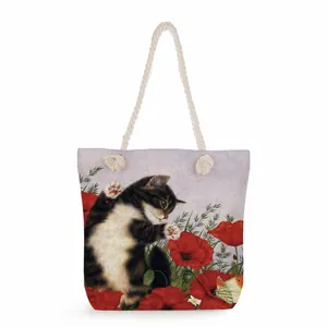 Detail of artistic cat and poppy print on canvas tote bag with thick cotton rope handle