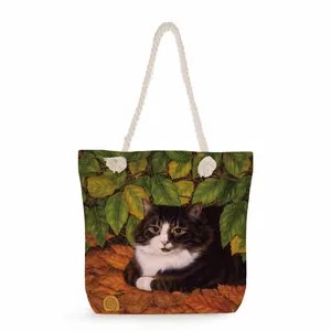 Canvas tote bag with cute cat and autumn leaves print featuring thick rope handles