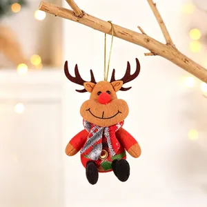 Detailed plush reindeer ornament with grey plaid scarf on a Christmas tree branch