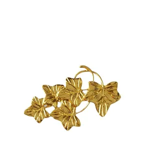 Elegant gold maple leaf brooch with detailed veins for autumn coat decoration
