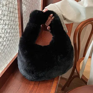 Faux fur black hobo handbag with soft plush texture for women's winter style