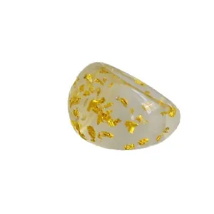 Minimalist transparent resin ring with embedded gold foil flakes for a stylish look