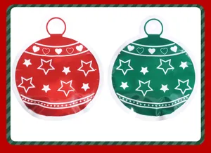 Detail of red and green Christmas ornament shaped self-sealing gift pouches