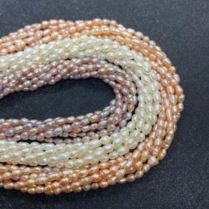 Rice-shaped natural freshwater pearls in white, pink, and purple colors for jewelry DIY