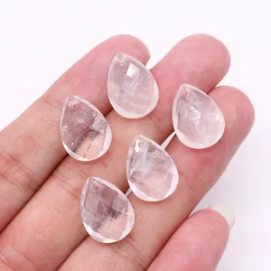Faceted teardrop natural stone pendants for DIY necklace making held in hand