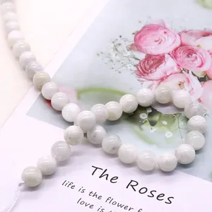 Polished natural white moonstone round beads for DIY jewelry necklaces with floral decor