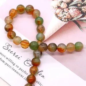 Round peacock agate beads with natural orange and green stripes for DIY jewelry making
