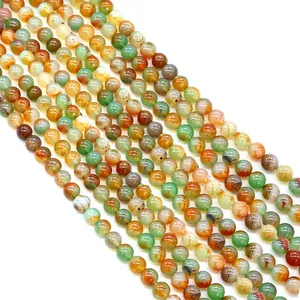 Polished natural agate round beads in vibrant green and orange tones for DIY jewelry
