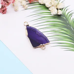 Irregular purple agate slice pendant with gold plated edges and double connector rings