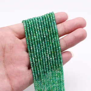 Macro detail of 2mm faceted dark green natural stone beads for DIY jewelry making