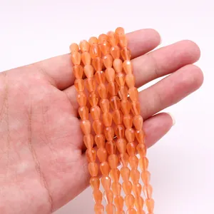Cuentas de lágrima naranjas facetadas con efecto ojo de gato para hacer collares DIY