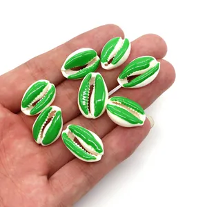 Macro detail of two-tone green and white conch shell beads for DIY jewelry making