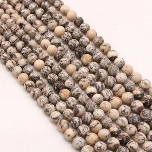 Natural round zebra stone beads with dark spots for DIY jewelry making and crafts