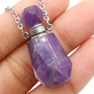 Handheld amethyst crystal perfume bottle necklace with silver chain and faceted stone