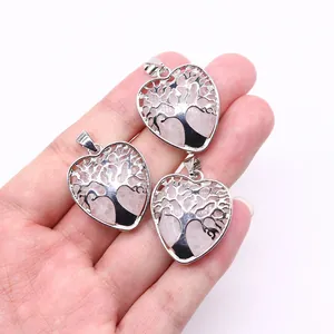 Three heart shaped pink quartz necklaces with silver tree of life metal wire wrap design