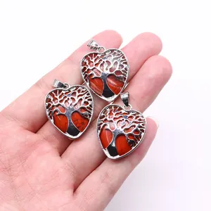 Three pieces of heart-shaped Tree of Life pendants with red jasper and silver hollow metal