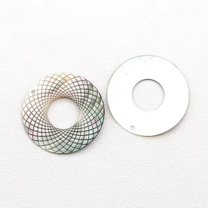 Natural round mother of pearl shell pendants with geometric engraving and iridescent luster