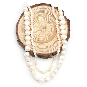 Natural white freshwater pearl necklaces set featuring large round and baroque pearls