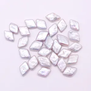 Irregular rhombus shaped freshwater baroque pearls in light purple with iridescent luster