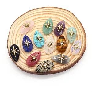 Faceted teardrop natural stone pendants with gold sun star inlays in various colors