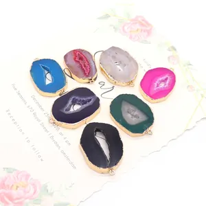 Seven colorful irregular agate pendants with gold plated edges and natural druzy crystals