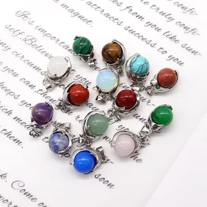Assorted natural stone sphere pendants with silver dolphin-style electroplated settings