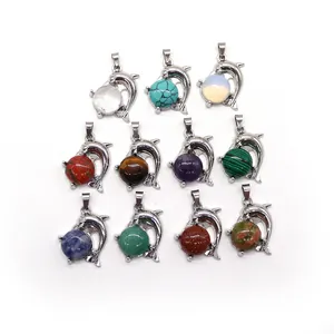 Dolphin turquoise stone pendants in silver metal frames with diverse gemstone options