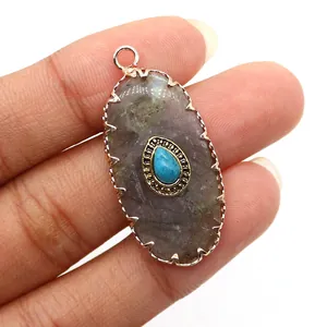 Detail of amethyst and blue turquoise oval pendant with scalloped gold frame for jewelry DIY