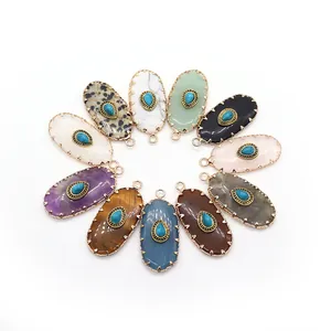 Set of 10 oval gemstone pendants with golden serrated edges and blue turquoise center