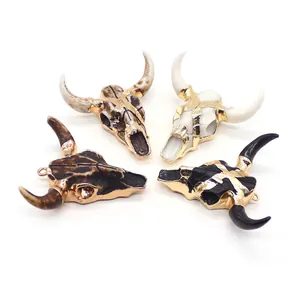 Hip hop style acrylic resin bull skull pendants with elegant gold plated accents