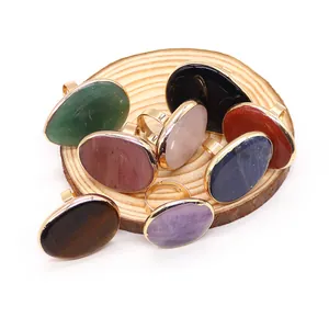 Set de 8 anillos ajustables de cobre con piedras naturales ovaladas de varios colores