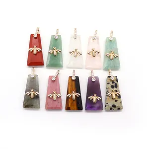 Set of 10 trapezoidal natural stone pendants with gold bee and zircon paved bail