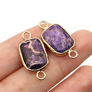 Macro shot of purple imperial stone connector with gold rim plating for DIY jewelry