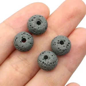 Detail showing natural volcanic lava rock beads with porous texture for DIY jewelry
