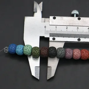 Macro shot of 8mm colorful lava rock beads with porous texture for DIY jewelry making