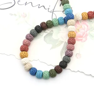 Colorful porous lava stone beads for DIY jewelry making displayed on a floral card