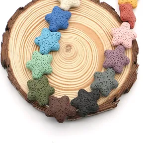 Colorful star-shaped lava stone beads for DIY jewelry making displayed on a wooden base
