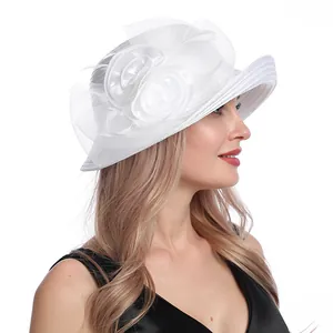 Side view of white mesh flower sun hat with elegant organza details for weddings