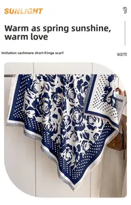 Detail of navy blue rose pattern cashmere-feel square scarf with delicate fringed edges